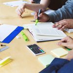 student-team-meeting-at-table