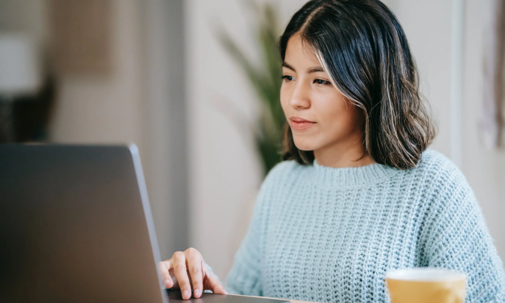 woman at computer studying