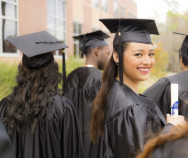 Smiling College student at graduation.